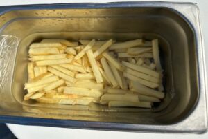 Cafe Old Vienna Hand cut Myrtle Beach fresh made French fries just waiting to jump in some hot oil. Cafe Old Vienna's Hand cut Myrtle Beach fresh made French fries just waiting to jump in some hot oil.